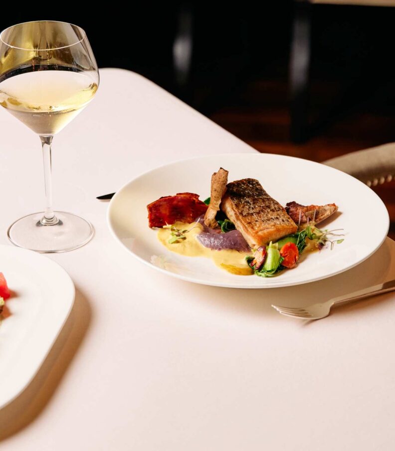 Assorted grilled cuisine plated with garnishes