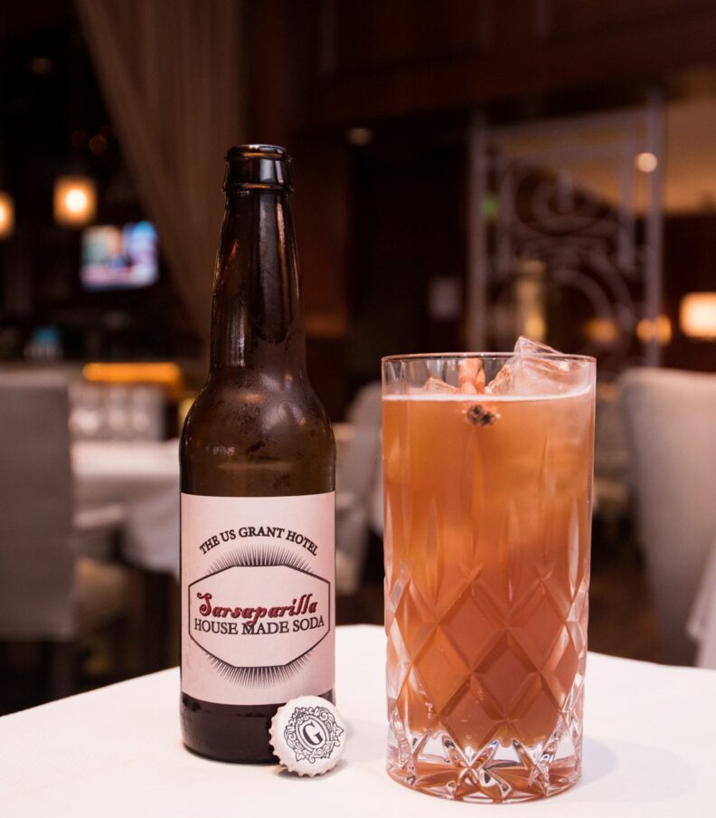 Chilled beverage with ice and citrus garnish at Grant Grill